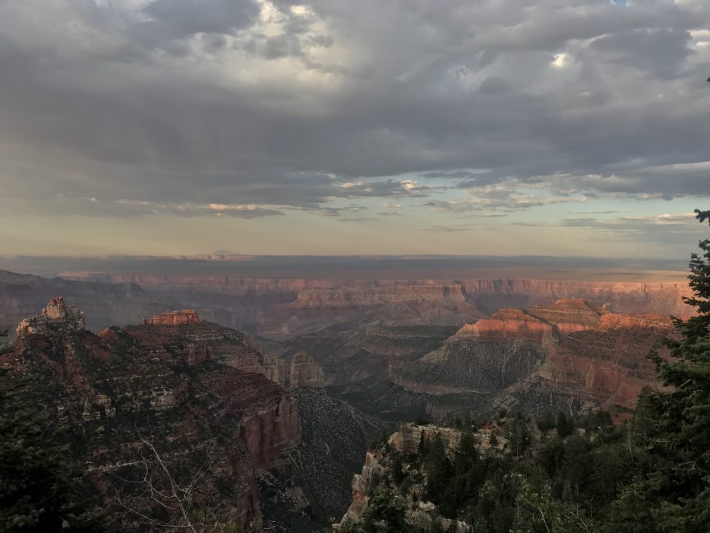 a view from up high overlooking Canyonlands National Park on an overcast day to show what recreation opportunities look like in the area