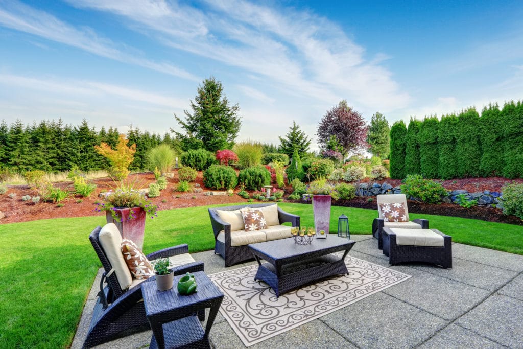 to show how a well-maintained back yard can enhance curb appeal and overall home attractiveness