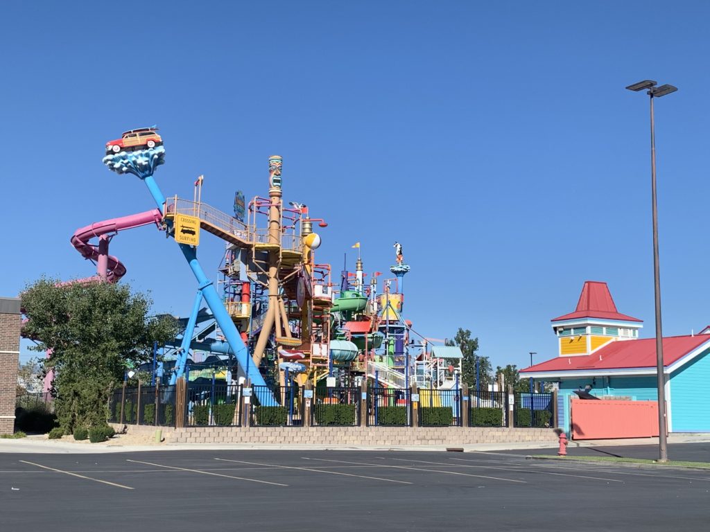 view of the slides at cowabunga bay in draper utah from outside of the water park