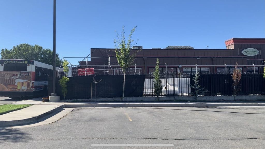 to show an exterior view of leatherheads sports bar and grill in draper utah outdoor courtyard