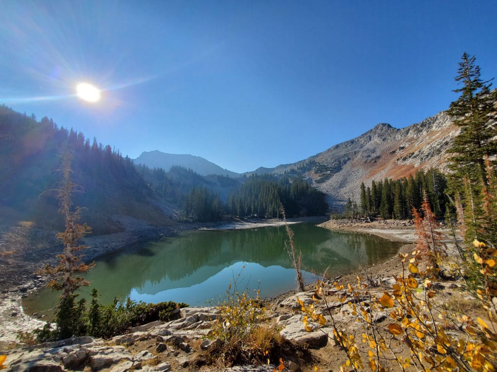 scenic red pine lake is a popular hiking destination in utah